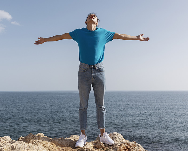 Physical therapist assisting patient with balance disorder rehabilitation