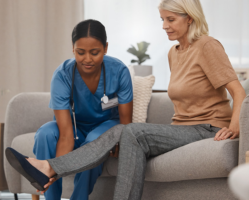 Physical therapist providing specialized care for leg pain relief and mobility improvement